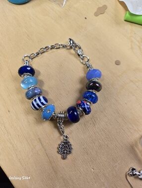 Handmade Blue Beaded Bracelet With Peacock Dangle